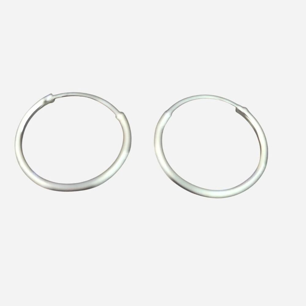 Small Sterling Silver Continuous Hoop Earrings – Brand New